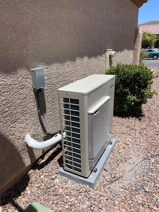 Residential air conditioning condenser unit in Red Bluff